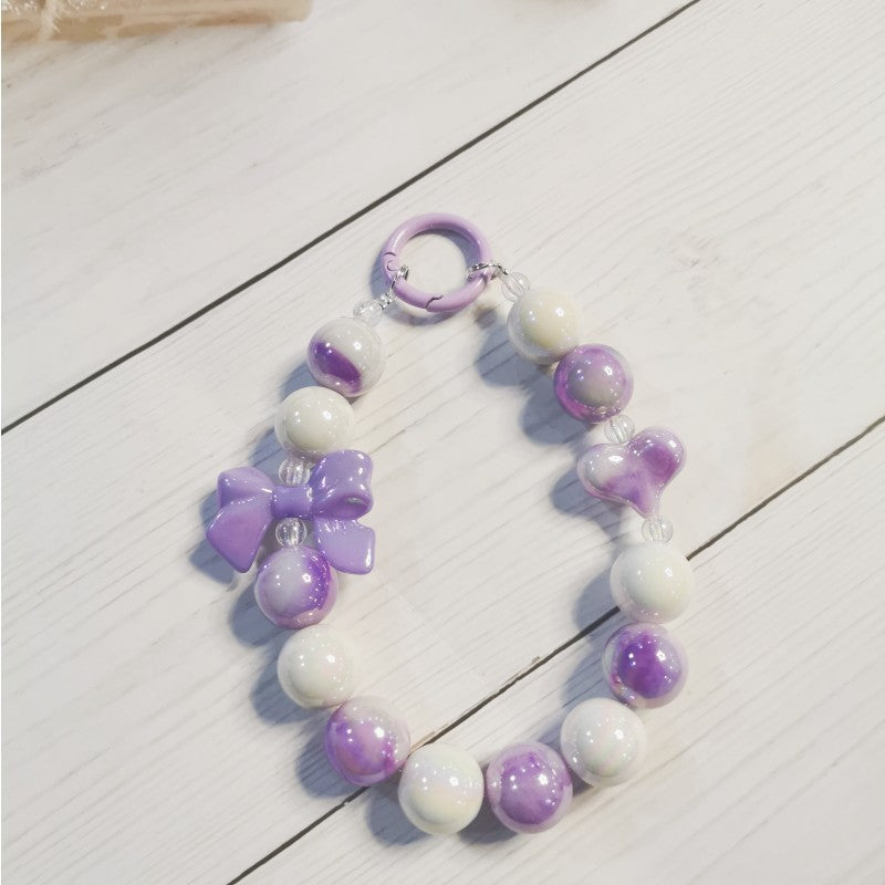 Wholesale Electroplated beaded bow car key chain mobile phone pendant cute candy color paint ring pearl accessories bag